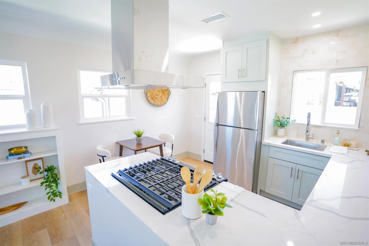 03 inside home inspection corridor craftsman for sale north park renovated kitchen dining nook portia green realtor compass san diego