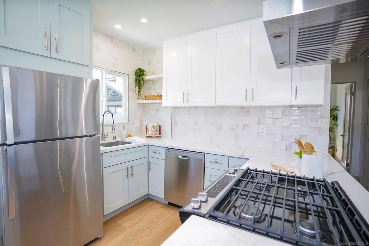 04 inside home inspection corridor craftsman for sale north park modern kitchen stainless steel appliances portia green realtor compass san diego