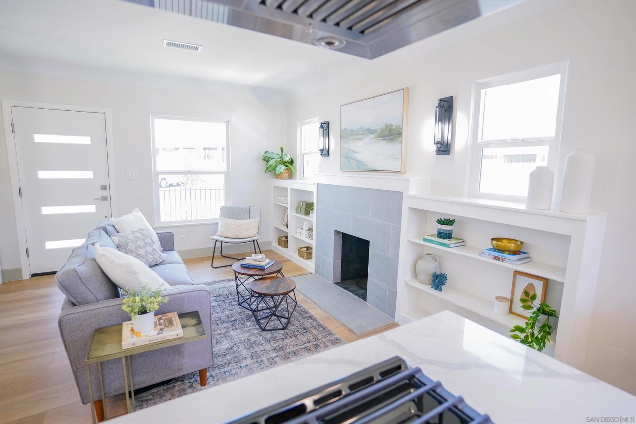 06 inside home inspection corridor craftsman for sale north park living room built ins fireplace portia green realtor compass san diego