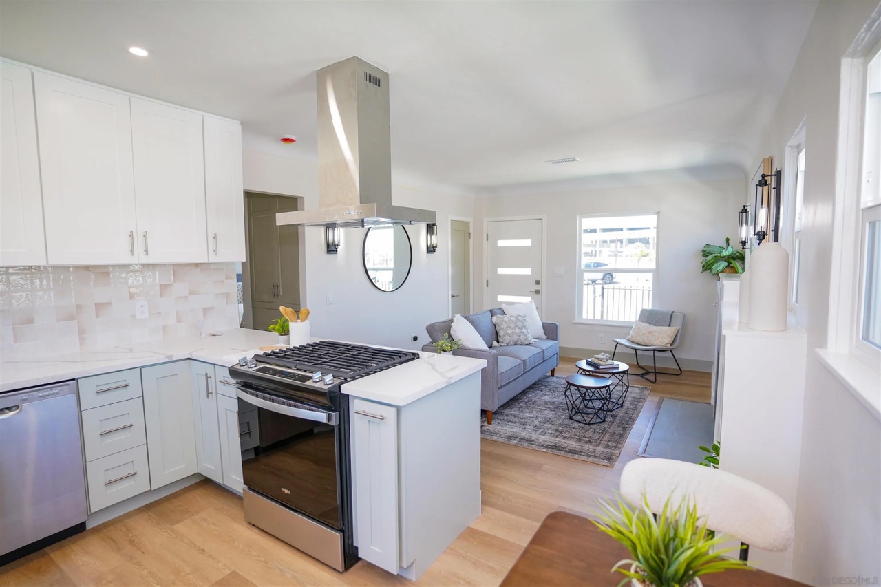07 inside home inspection corridor craftsman for sale open floor plan kitchen living room portia green realtor compass san diego