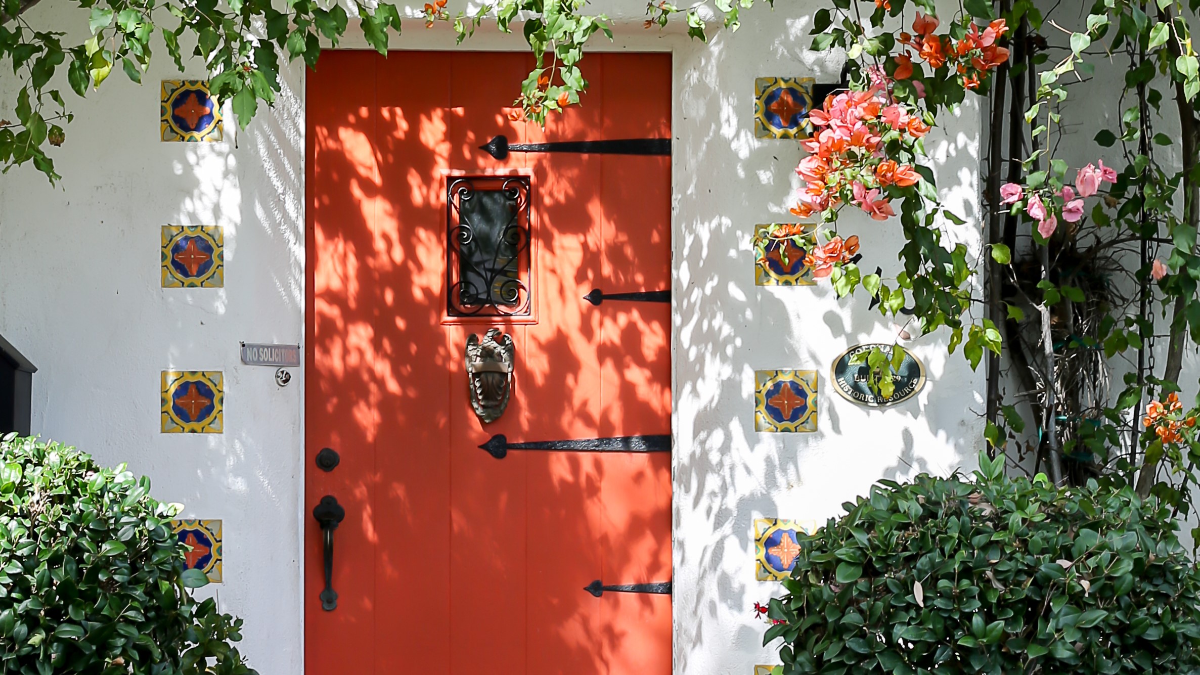 Historic beachfront home in Coronado featuring coastal architecture and modern restoration